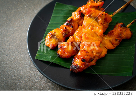grilled chicken skewer in Asian style grilled chicken skewer in Asian style 128335228