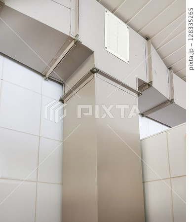 Industrial ventilation, air duct with metal box, indoors, vertical 128335265