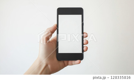 hand holding a black smartphone with a blank white screen. The hand is positioned in a way that the fingers are slightly curled around the phone. hand holding a black smartphone with a blank white screen. The hand is positioned in a way that the fingers are slightly curled around the phone. 128335816