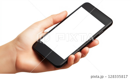 hand holding a black smartphone with a blank white screen. The hand is positioned in a way that the fingers are slightly curled around the phone. 128335817