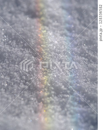Rainbow is reflected in the snow 128336582