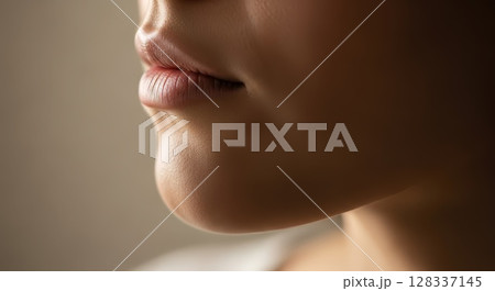 Soft Focus Close Up of Young Womans Lips and Chin with Natural Skin Texture Soft Focus Close Up of Young Womans Lips and Chin with Natural Skin Texture 128337145