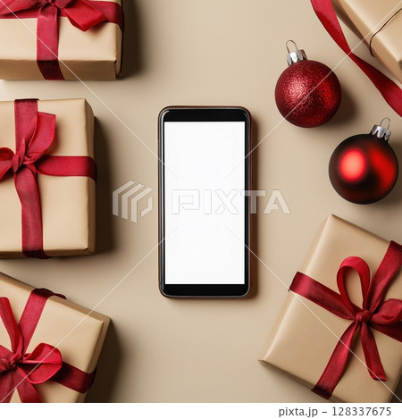smartphone with a blank white screen lying on top of a stack of gift boxes. The gift boxes are wrapped in brown paper and tied with red ribbons and bows. smartphone with a blank white screen lying on top of a stack of gift boxes. The gift boxes are wrapped in brown paper and tied with red ribbons and bows. 128337675