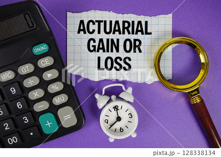 Actuarial Gain or Loss text with alarm clock, magnifying glass anc calculator on purple background Actuarial Gain or Loss text with alarm clock, magnifying glass anc calculator on purple background 128338134