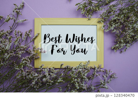 Best Wishes for you text with flowers bouquet decoration on purple background 128340470