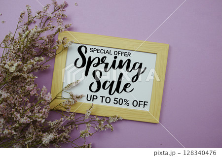 You are Amazing text with flowers bouquet decoration on purple background 128340476