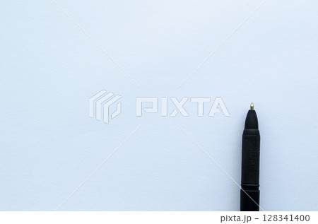 Black pen placed on white cover background with customizable space for text 128341400