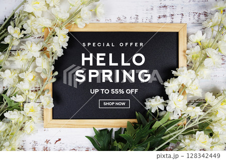 Spring Sale 55% off with flowers decoration on wooden background Spring Sale 55% off with flowers decoration on wooden background 128342449