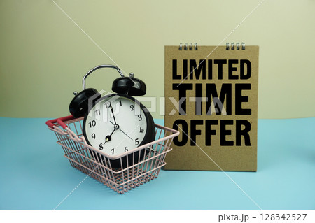 Limited time offer Promotion and Marketing wiht mini basket shopping cart and alarm clock on blue and yellow background Limited time offer Promotion and Marketing wiht mini basket shopping cart and alarm clock on blue and yellow background 128342527