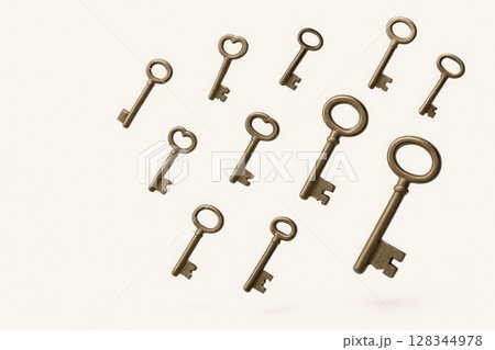 Antique bronze keys in the air, on a white background. Space for text. Antique bronze keys in the air, on a white background. Space for text. 128344978