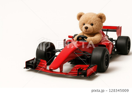 Mishka at the wheel of a racing car. Space for text. Mishka at the wheel of a racing car. Space for text. 128345009