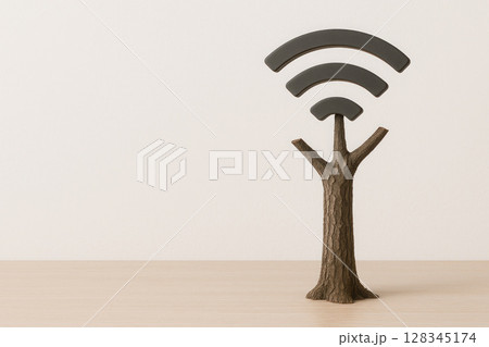 Tree in the form of a Wi-Fi antenna, a connection between nature and technology. Space for text. 128345174