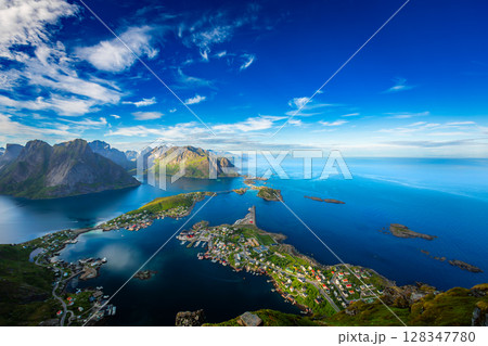 Amazing landscape of the Lofoten Islands from the top of Reinebringen Mountain with blue sky , county of Nordland, Norway. Amazing landscape of the Lofoten Islands from the top of Reinebringen Mountain with blue sky , county of Nordland, Norway. 128347780