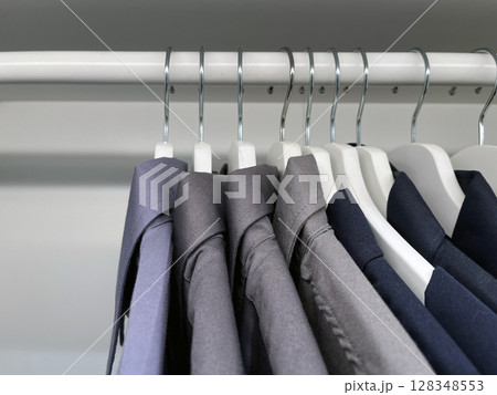 Close up shirts or business clothes on hangers 128348553