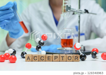 Conducting a detailed chemical experiment on the acceptor concept in a controlled lab setting Conducting a detailed chemical experiment on the acceptor concept in a controlled lab setting 128348963