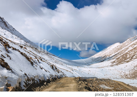 mountains in snow 128351307