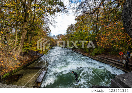 Golden autumn view in famous Munich relax place - Englischer Garten. Munich, Bavaria, Germany Golden autumn view in famous Munich relax place - Englischer Garten. Munich, Bavaria, Germany 128351532