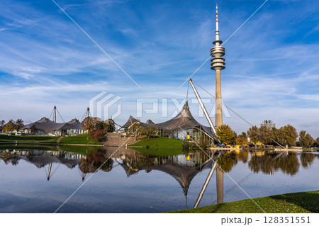 Golden autumn view in the Olympiapark in Munich, Germany, an Olympic Park for the 1972 Summer Olympics Golden autumn view in the Olympiapark in Munich, Germany, an Olympic Park for the 1972 Summer Olympics 128351551