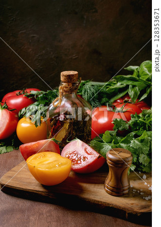 Fresh Vegetables Oil Bottle Wooden Board 128353671
