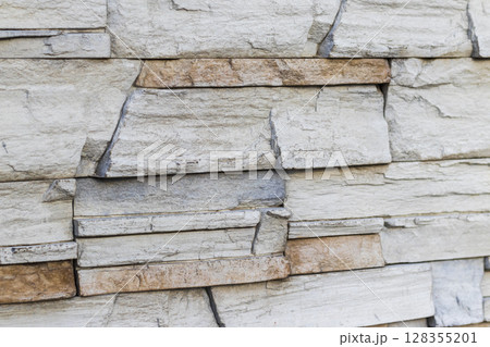 Close up shot of the decorative stone wall Close up shot of the decorative stone wall 128355201