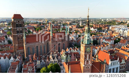 Aerial photo taken by drone over the historic tourist center of Gdansk, the city hall and the cathedral on a summer day, Poland, Europe 128355208