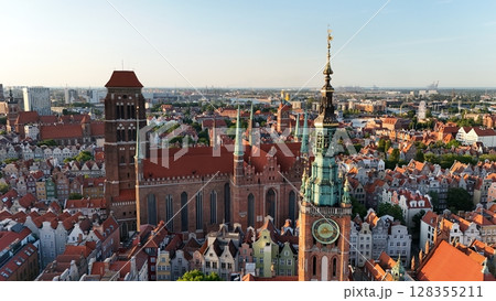 Aerial photo taken by drone over the historic tourist center of Gdansk, the city hall and the cathedral on a summer day, Poland, Europe Aerial photo taken by drone over the historic tourist center of Gdansk, the city hall and the cathedral on a summer day, Poland, Europe 128355211