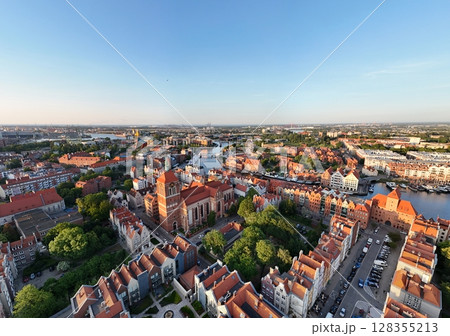 Aerial photo taken by drone over the historic tourist center of Gdansk, the city hall and the cathedral on a summer day, Poland, Europe Aerial photo taken by drone over the historic tourist center of Gdansk, the city hall and the cathedral on a summer day, Poland, Europe 128355213