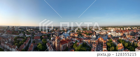 Aerial photo taken by drone over the historic tourist center of Gdansk, the city hall and the cathedral on a summer day, Poland, Europe Aerial photo taken by drone over the historic tourist center of Gdansk, the city hall and the cathedral on a summer day, Poland, Europe 128355215