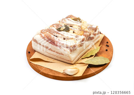 Traditional salted pork fat with spices isolated on white background 128356665