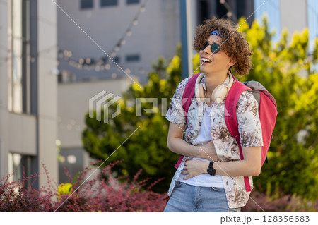 Young tourist man feeling sudden strong abdominal stomach ache, gastritis problem poisoning diarrhea 128356683
