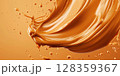 Smooth orange batter splashes in mid-air against a warm background, showcasing its glossy finish and dynamic movement, reflecting the creativity involved in culinary arts. 128359367