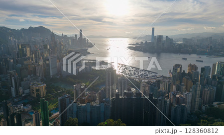 June 24 2025 Harbour Reflections Shine at Kowloon Sunset Hour 128360812