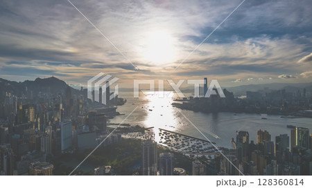 June 24 2025 Harbour Reflections Shine at Kowloon Sunset Hour 128360814