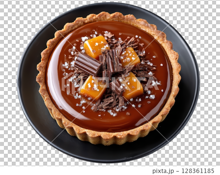 Glossy Chocolate Tart with Sea Salt Caramel Filling and Chocolate Shavings on a Dark Plate 128361185