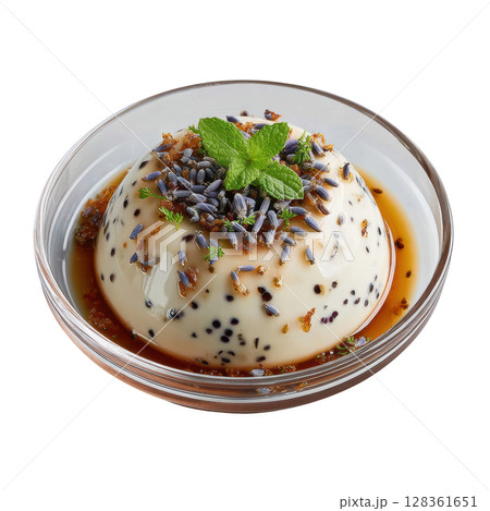 Elegant Lavender Panna Cotta Dessert Infused with Floral Flavors and Topped with Blueberry Compote and Mint Leaf Elegant Lavender Panna Cotta Dessert Infused with Floral Flavors and Topped with Blueberry Compote and Mint Leaf 128361651