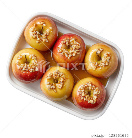 Deliciously Baked Apples with Cinnamon and Nuts for a Tasty Dessert Experience 128361653