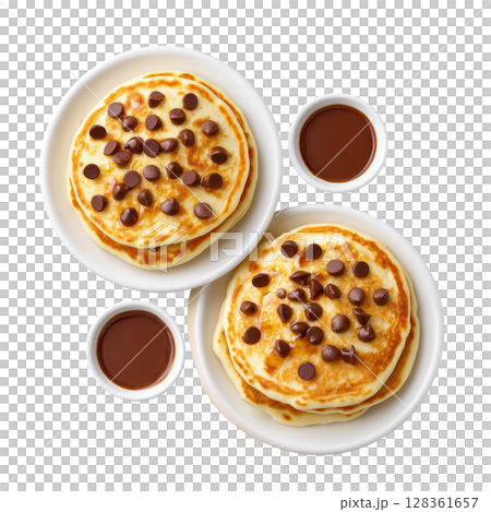 Fluffy Chocolate Chip Pancakes Served with Rich Syrup in White Plates, Perfect for Breakfast or Brunch 128361657