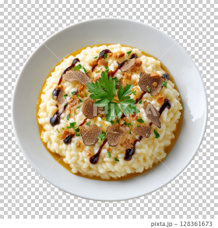 Creamy Risotto Infused with Black Truffle and Topped with Shaved Truffle Slices for Gourmet Dish Experience 128361673