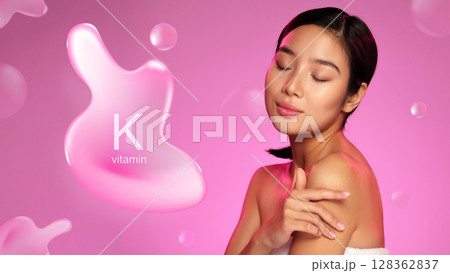 Promoting skincare with vitamin K in serene beauty setting with pink backdrop 128362837