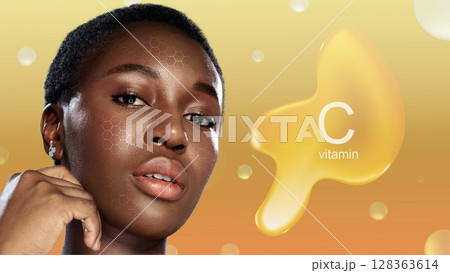 Woman showcases glowing skin with vitamin C essence in beauty routine at sunset Woman showcases glowing skin with vitamin C essence in beauty routine at sunset 128363614