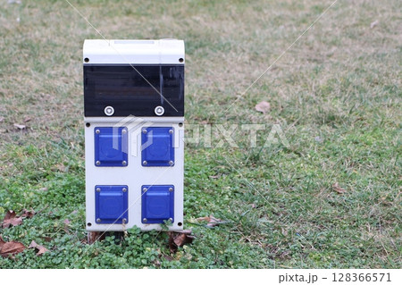 Utility Box Located in a Green Space Designated for Various Outdoor Purposes and Connectivity 128366571