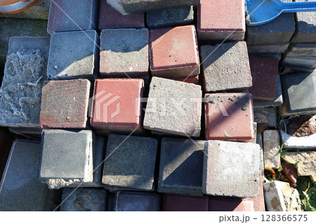 A Tower of Vibrantly Colored Paving Stones Carefully Stacked for Beautiful Landscaping A Tower of Vibrantly Colored Paving Stones Carefully Stacked for Beautiful Landscaping 128366575