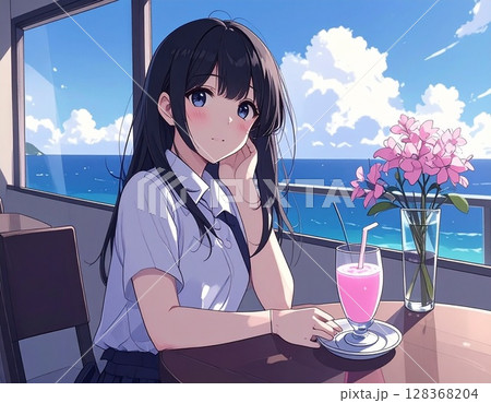 カフェで飲み物を飲む女の子 128368204