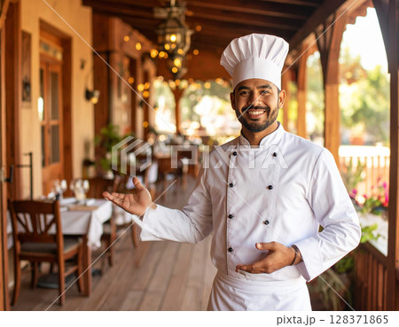 AI generated image of a professional chef in traditional white uniform gesturing to welcome diners into an elegant western restaurant. 128371865
