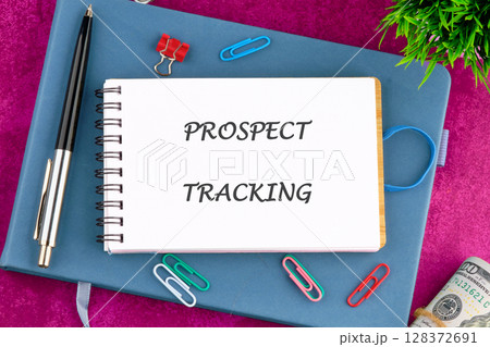 A conceptual phrase on the topic of business PROSPECT TRACKING. Economy and business concept. A conceptual phrase on the topic of business PROSPECT TRACKING. Economy and business concept. 128372691
