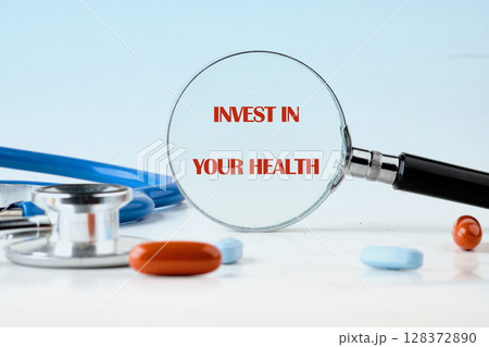 THE CONCEPT PHRASE INVEST IN YOUR HEALTH. Concept health, sport, diet and fitness THE CONCEPT PHRASE INVEST IN YOUR HEALTH. Concept health, sport, diet and fitness 128372890
