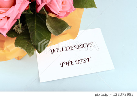 The concept phrase is YOU DESERVE THE BEST. The concept of good mood. Self care and happiness concept 128372983