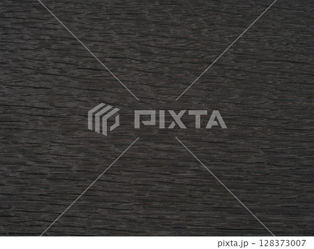 Dark gray stained oak veneer with a horizontal saw cut grain texture. Dark gray stained oak veneer with a horizontal saw cut grain texture. 128373007