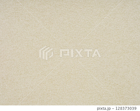 The creamy texture of this paper evokes warmth, offering a canvas of comfort and subtle creativity 128373039