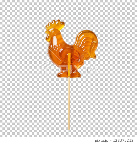 Transparent caramel colored rooster shaped lollipop on a stick 128373212